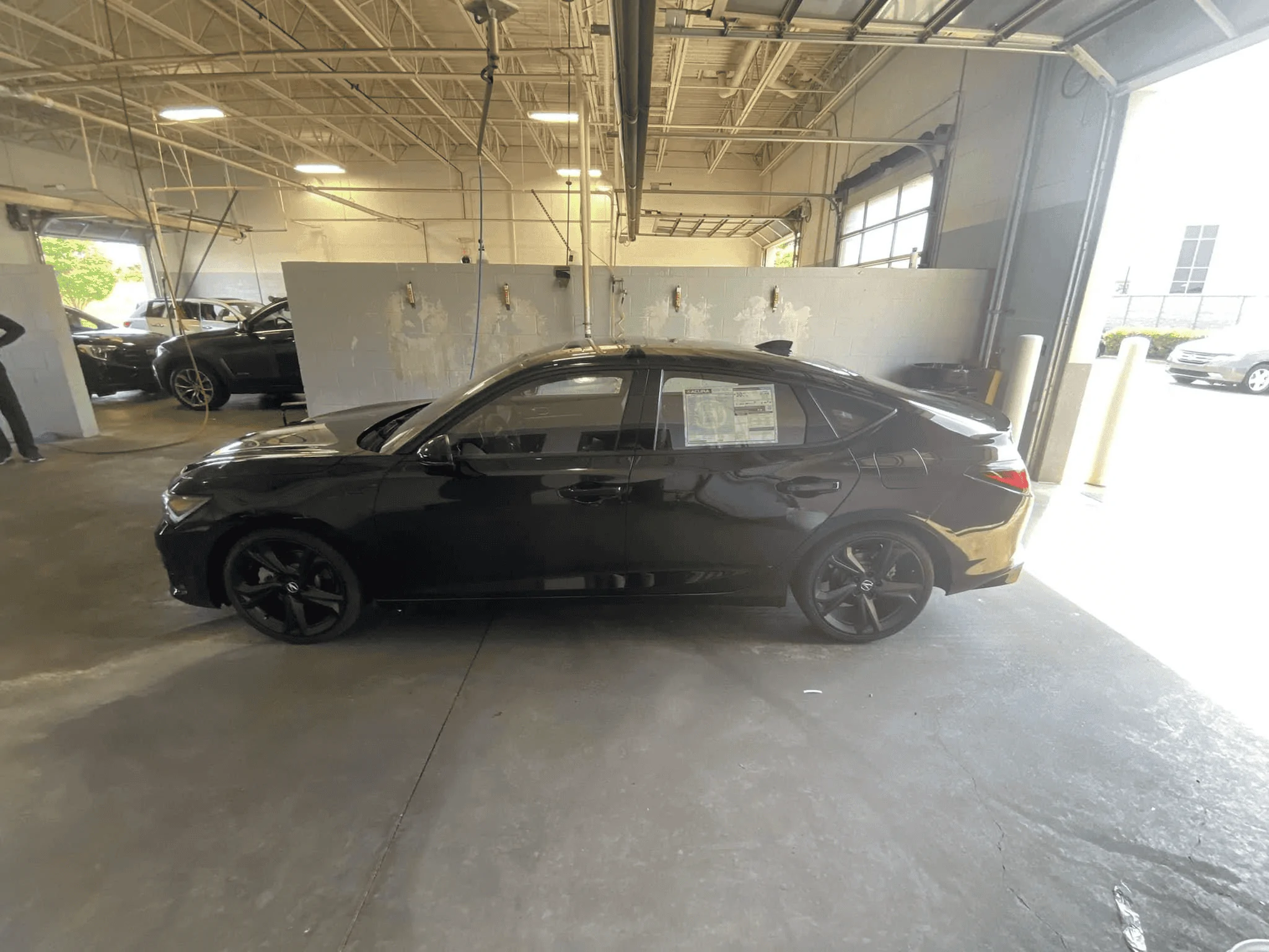 Acura Integra Majestic Black 2023 Integra w/ blacked out badges and black 19” wheels 1653858481560