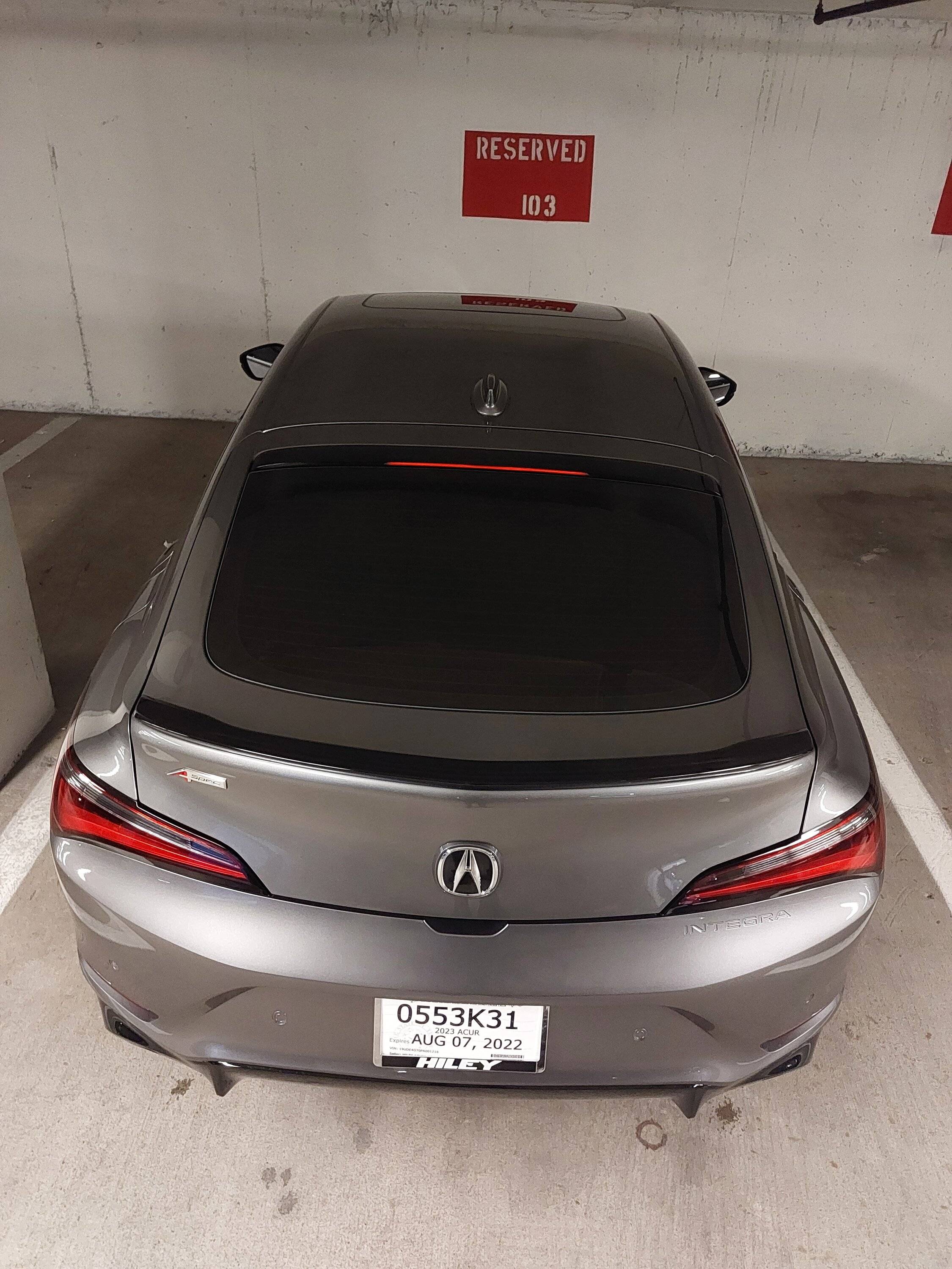 Acura Integra White 2023 Integra with vinyl wrapped gloss black roof, mirrors, and Acura front and back emblem 20220609_172628