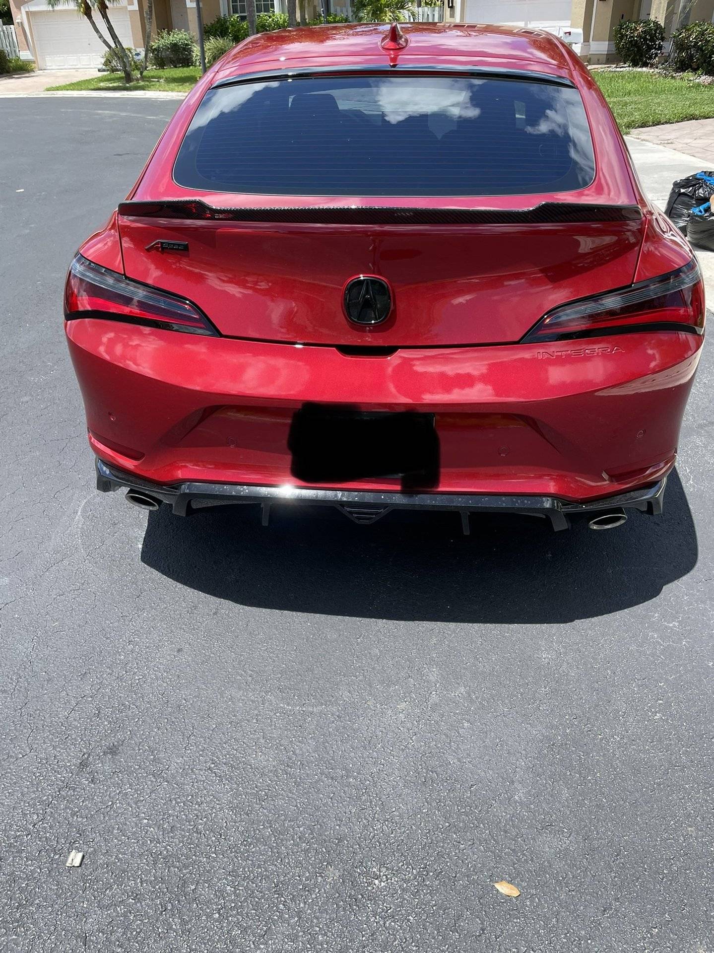 Acura Integra Factory OEM Accessories Installed on Performance Red Pearl 2023 Integra Performance Red Pearl Integra With Factory OEM Accessories Installed 1