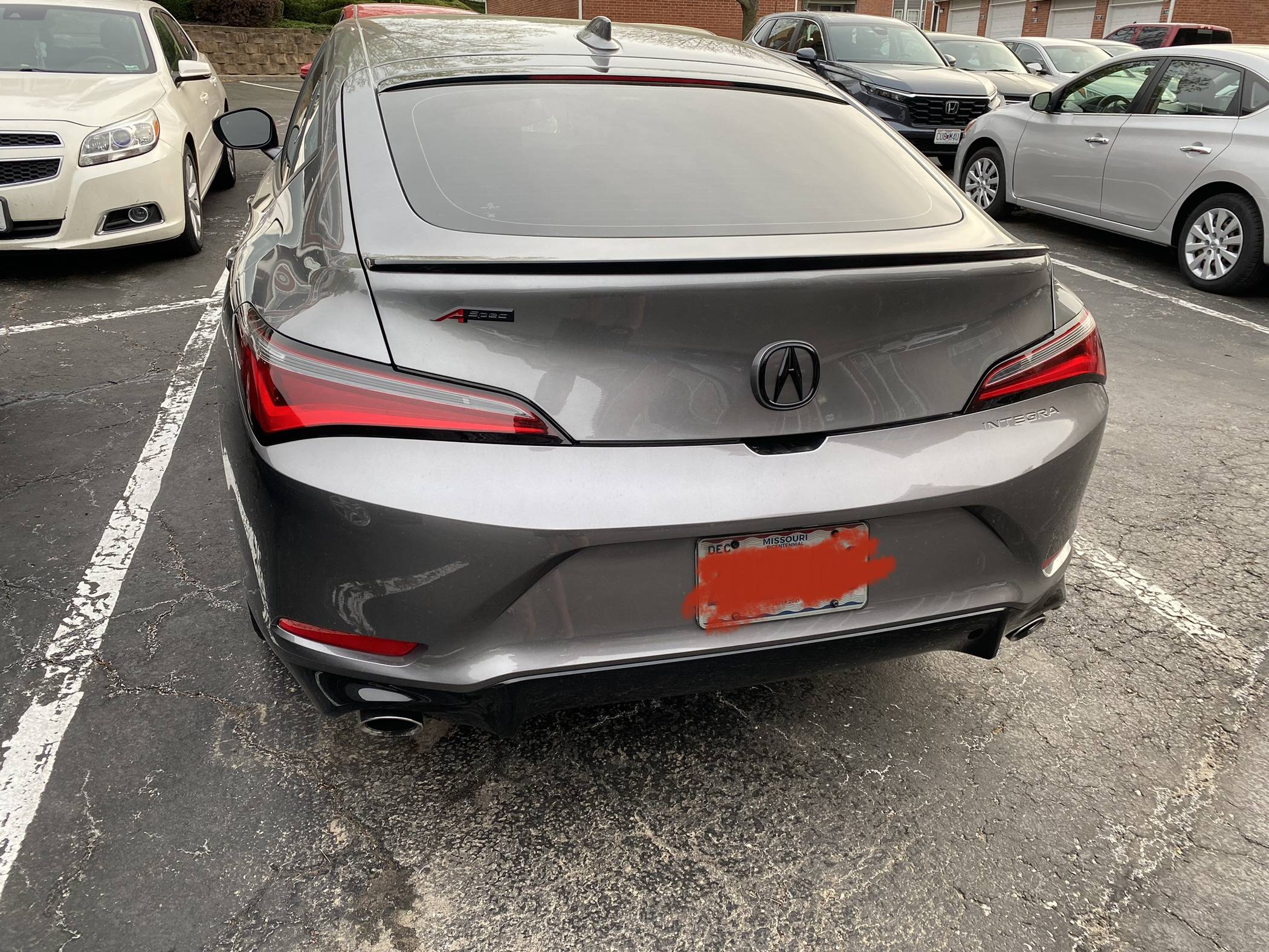 Acura Integra Rear black emblem install with white background. B0D9E722-E848-4576-A2A2-FF6157D93966