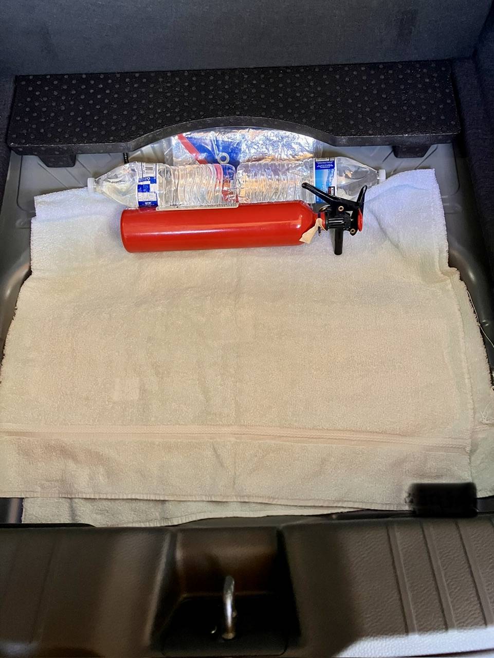 Acura Integra Hidden storage space in ITS! -- floor of the spare tire well IMG_2840