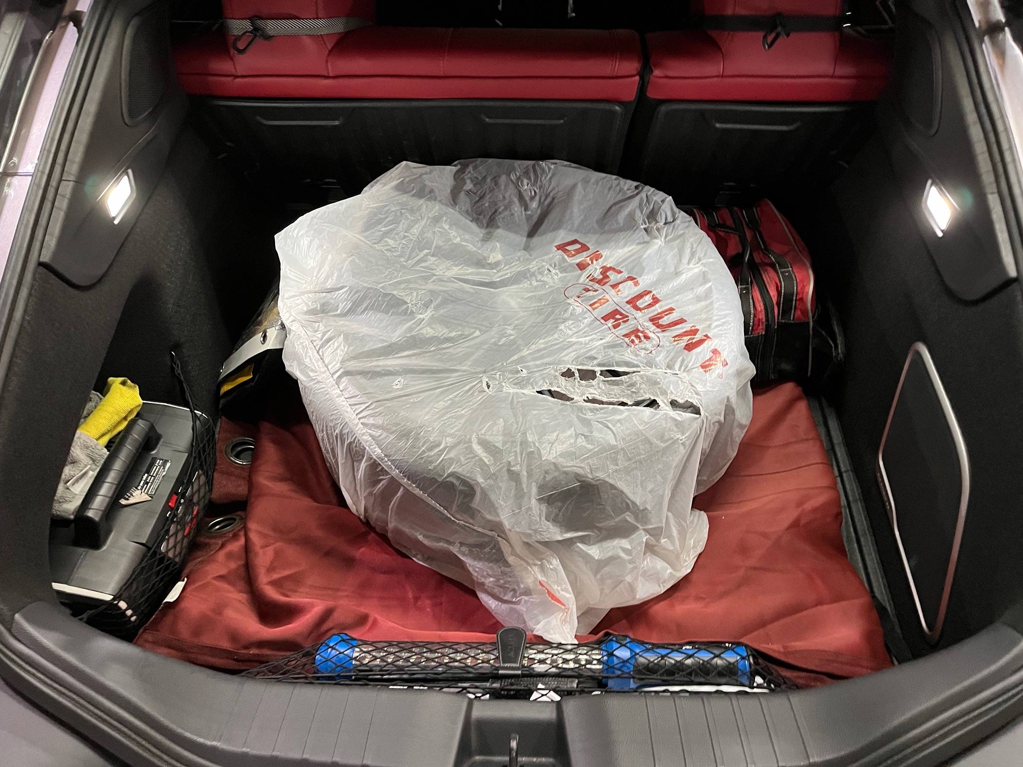 Acura Integra Full sized spare, how to store in back? IMG_2329