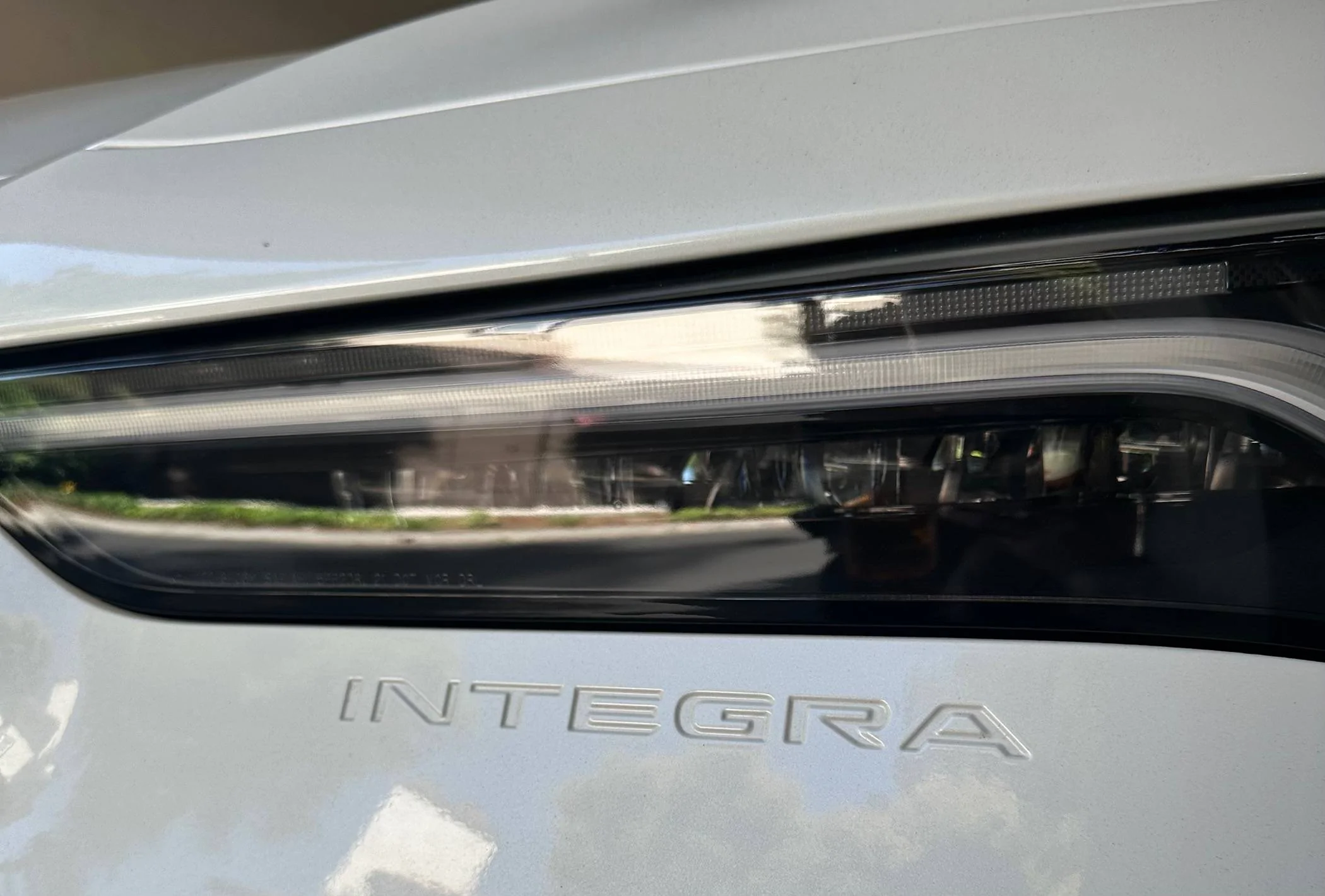 Acura Integra Residue on inside of both headlights IMG_0106