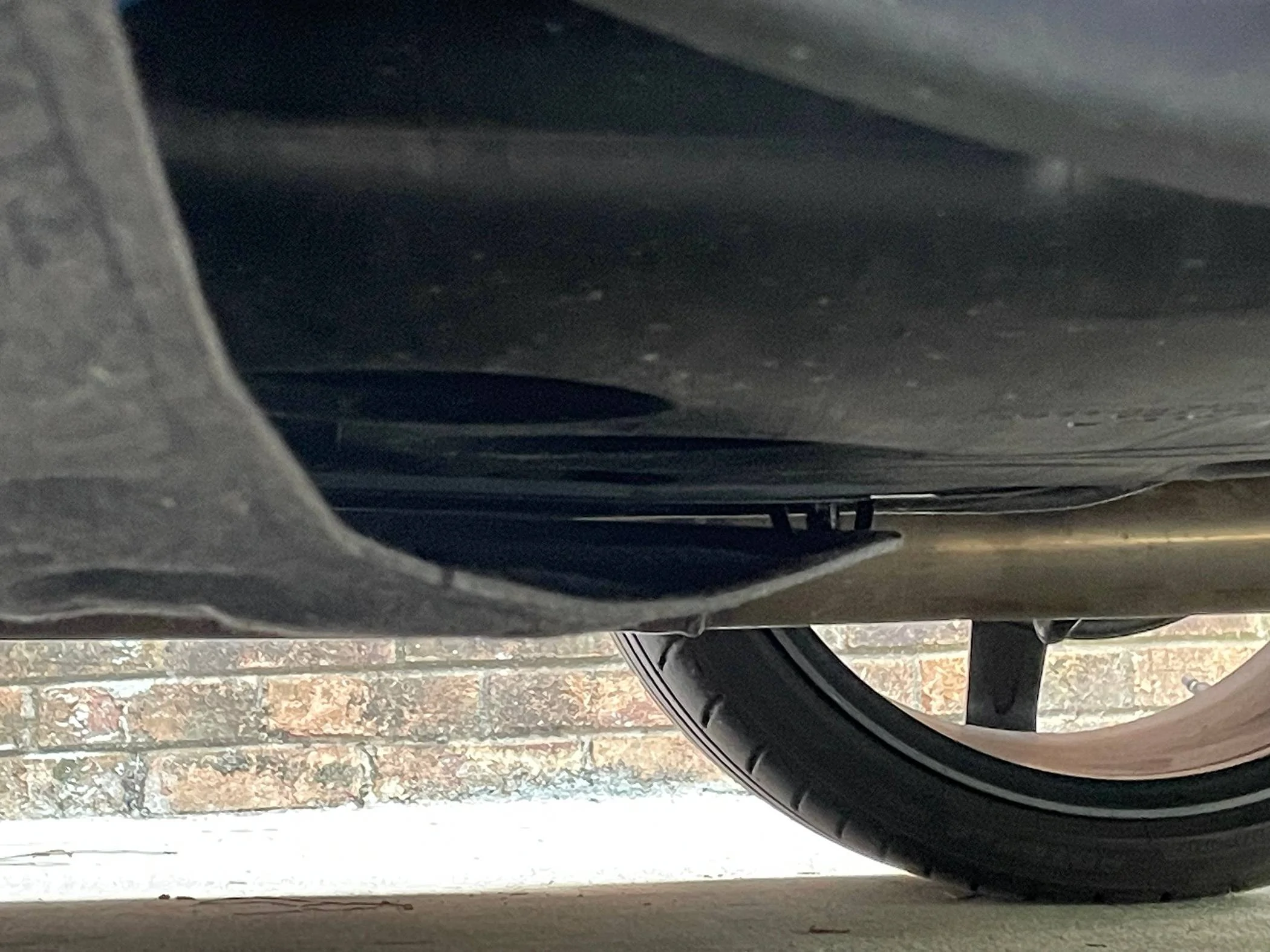 Acura Integra one rattle fixed possible loose clip under car.. IMG_2842