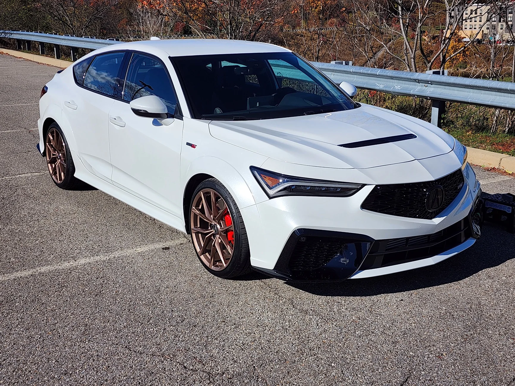 Acura Integra Copper wheels and black badges 20251106_122204