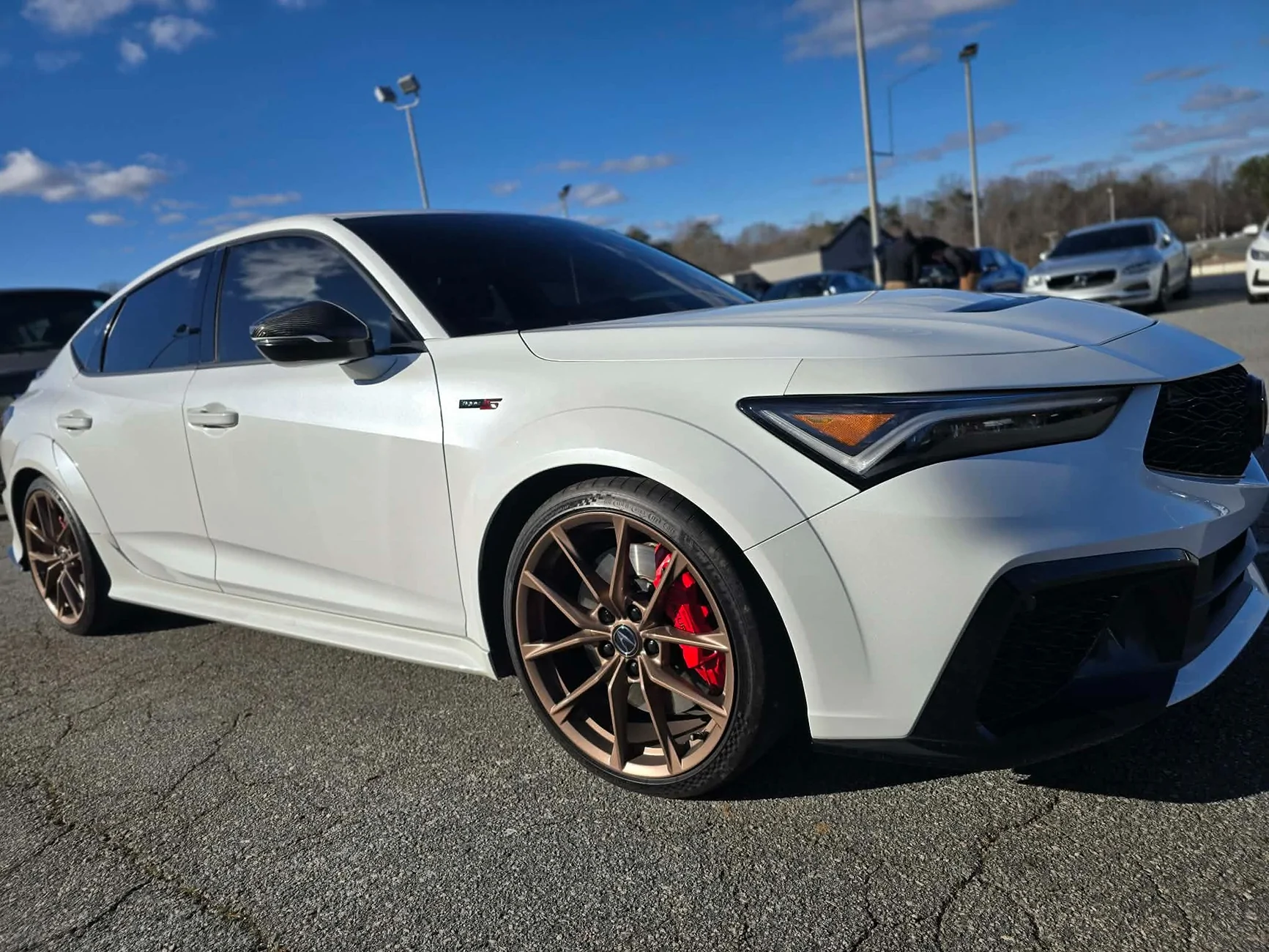 Acura Integra Copper wheels and black badges 8233
